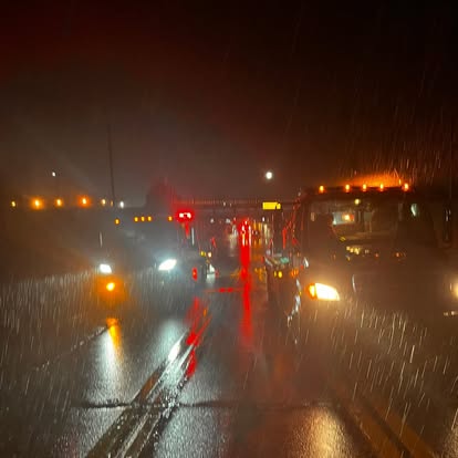 Mike's Wrecker responding in heavy rain at night