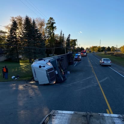 Overturned semi-trailer on the highway during recovery