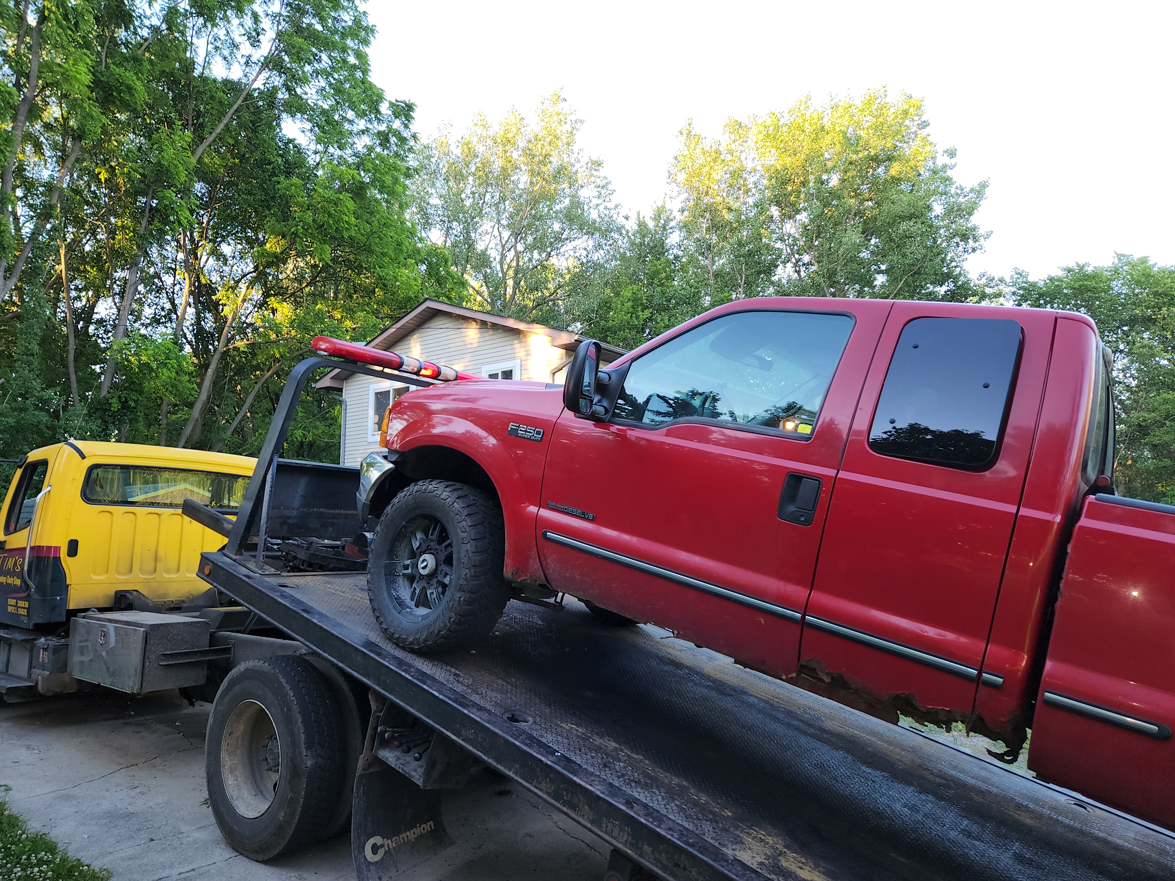 Pickup truck on a Mike's Wrecker flatbed