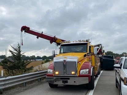 Mike's Wrecker heavy-duty wrecker with boom deployed
